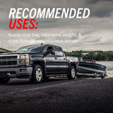 Black pickup truck towing a boat with Brake Pad FMSI Number D2404 installed outdoors