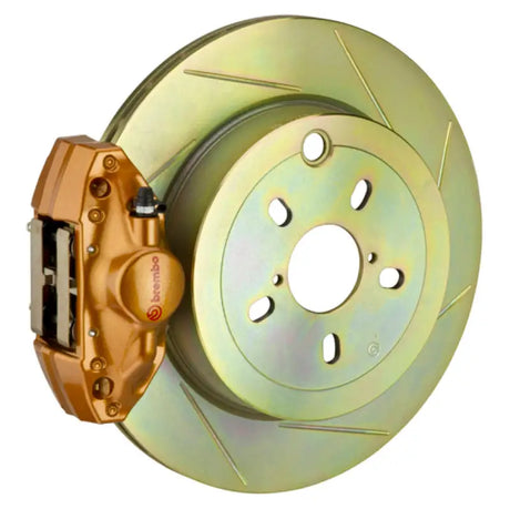 Gold-colored brake rotor and caliper with elec park brake and pis cast 2pc design