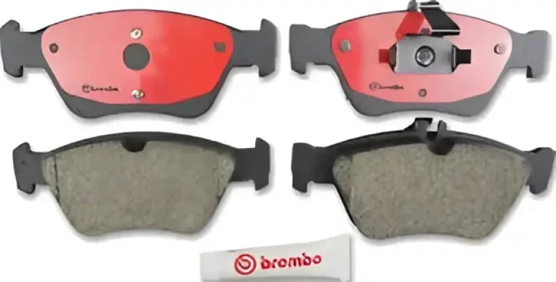 Red Brembo P50023N disc brake pads with hardware and box for p50023n disc brake boost