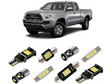 Silver pickup truck with cali raised interior led light kit featuring LED bulbs