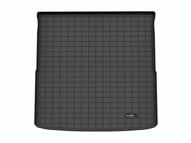 Black rubberized cargo area liner with raised edges, non-skid, TPE injection molded material