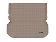 Tan gridded cargo area liner with raised edges, non-skid TPE material for SUV cargo area