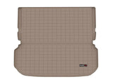 Tan gridded cargo area liner with raised edges, non-skid TPE material for SUV cargo area