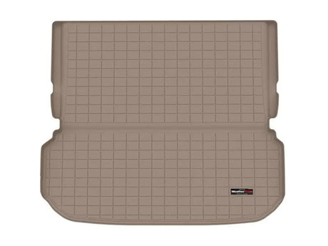 Tan gridded cargo area liner with raised edges, non-skid TPE material for SUV cargo area