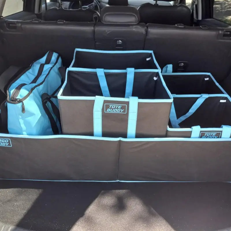 Cargo Buddy black collapsible polyester cargo organizer in SUV trunk with blue trim and single compartment, 40.75-inch length, 21-inch width, 10-inch height, 5 cubic foot capacity.