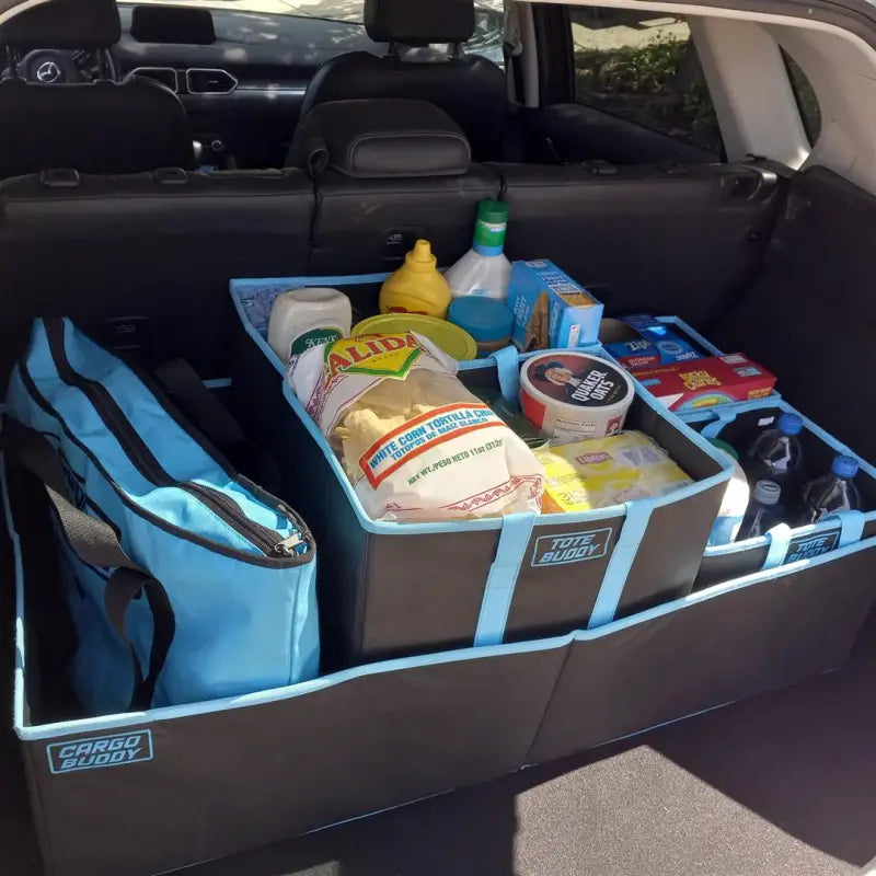 Cargo Buddy single compartment collapsible cargo organizer in the cargo area of an SUV, filled with groceries.