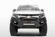 White Chevrolet truck equipped with Fab Fours Vengeance Front Bumper Pre-Runner Guard in black, designed for maximum protection and enhanced rugged appearance.