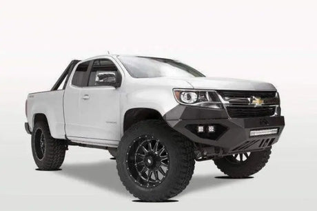 Fab Fours Vengeance Front Bumper with Pre-Runner Guard on a white Chevrolet off-road vehicle.