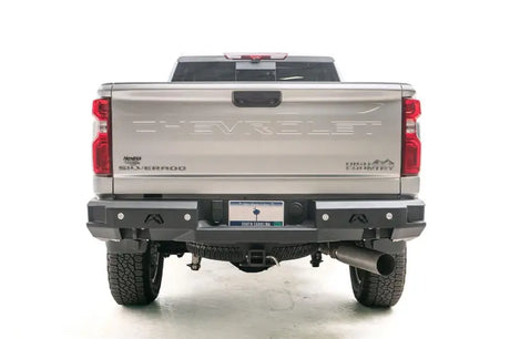 Rear view of a Chevrolet Silverado High Country with the CH20-W4951-1 Fab Fours Premium Rear bumper installed, enhancing protection and style for off-road adventures, Bumpers, Grilles & Guards, AVADA - Best Sellers, Must Haves