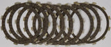 Stack of dark brown clutch plates with silver tabs for CK3447 Redline Clutch Kit