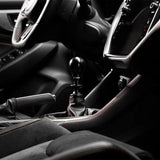 Stylish black car interior featuring COBB Subaru 6-Speed Weighted Knob and collars