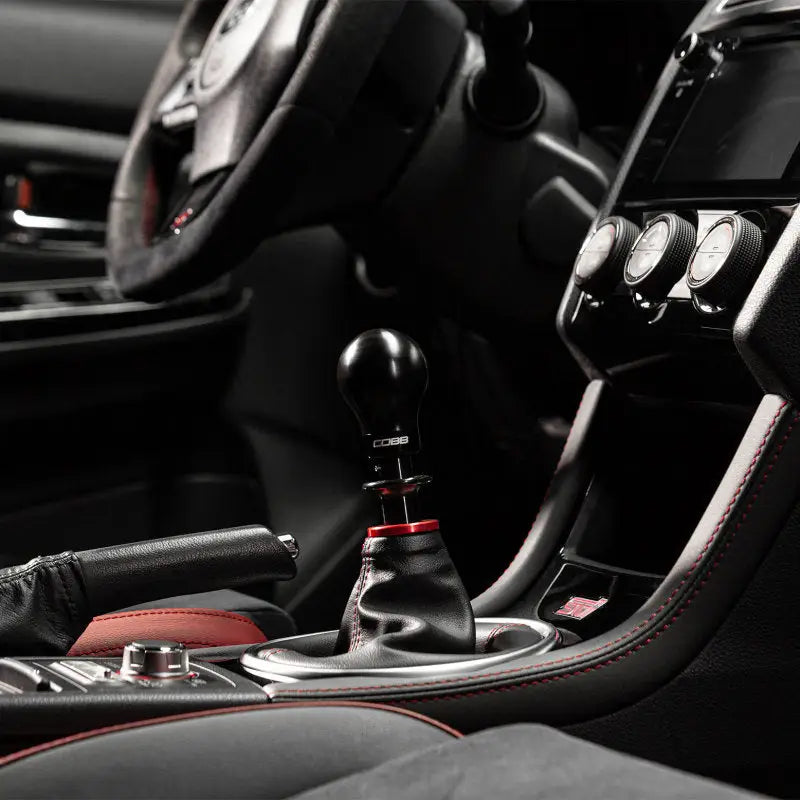 Black shift knob with red accents from Cobb Subaru 6-Speed Weighted COBB Knob
