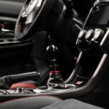 Black shift knob with red accents from Cobb Subaru 6-Speed Weighted COBB Knob