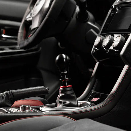 Black shift knob with red accents from Cobb Subaru 6-Speed Weighted COBB Knob