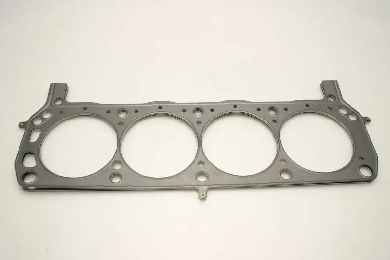 Metal head gasket with four circular openings for Cometic Ford AFR heads engine build