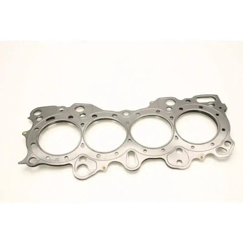 A Cometic Gasket Cometic Honda CRX/Civic/Integra -VTEC 81mm .030 inch MLS Head Gasket with four circular openings, designed for a Honda CRX/Civic/Integra VTEC 81mm engine. The gasket features an irregular shape with multiple holes and notches around its perimeter, displayed on a plain white background.