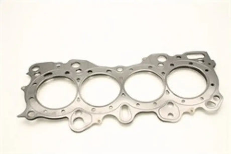 The Cometic Gasket, specifically the Cometic Honda CRX/Civic/Integra - VTEC 81mm .030 inch MLS Head Gasket, is designed with four circular openings to fit over the cylinders in an internal combustion engine. It includes multiple small holes and cutouts around its perimeter for bolts and fluid passage. The background is plain white.