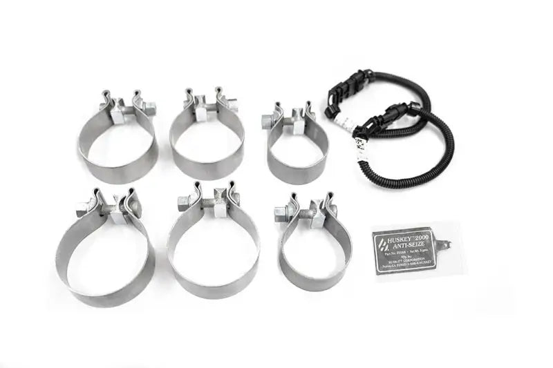Stainless steel clamps, wiring harness, and Huskey 2000 anti-seize packet for CORSA 16-20 Chevrolet Camaro SS/ZL1 6.2L V8 Polished Xtreme Axle-Back Exhaust with Factory NPP Valve.