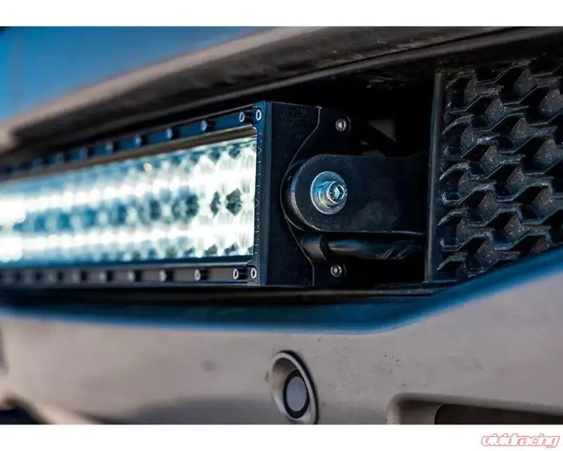 Illuminated LED light bar on Ford Ranger fog mounts by Cali Raised for better visibility