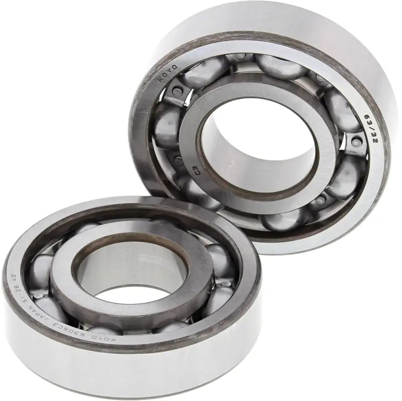 Two ball bearings from Crankshaft Bearing Seal Kit for smooth engine performance