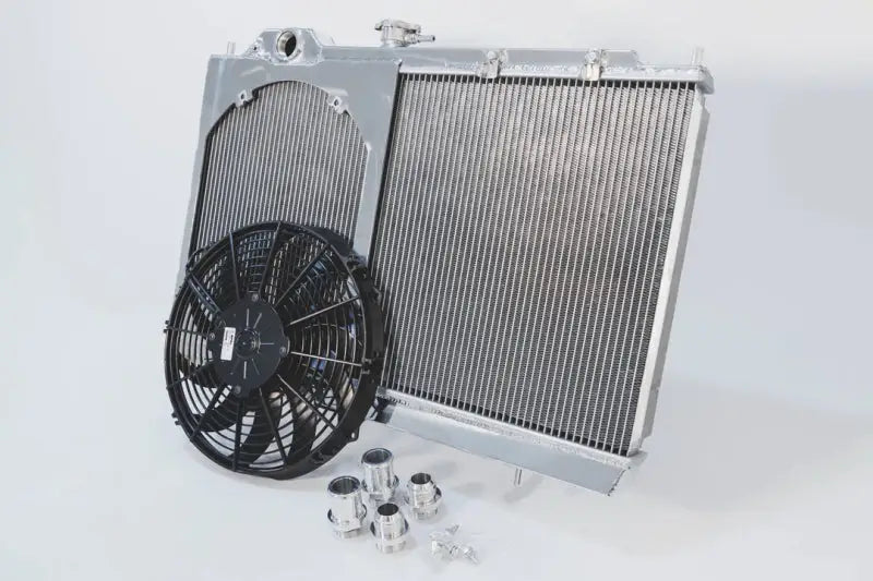 CSF 01-07 Mitsubishi Evo 7/8/9 Full Size Slim Radiator with 12in Fan & Shroud, Adjustable -16AN & Slip-On Fittings by The Cooling Experts.
