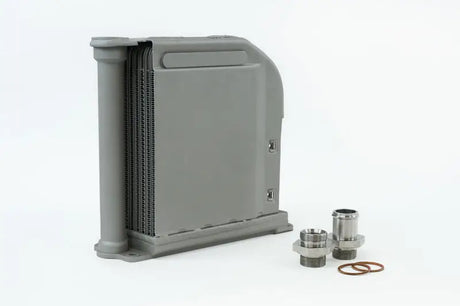 Gray heat exchanger with fittings for Porsche 911 engine oil cooler upgrade