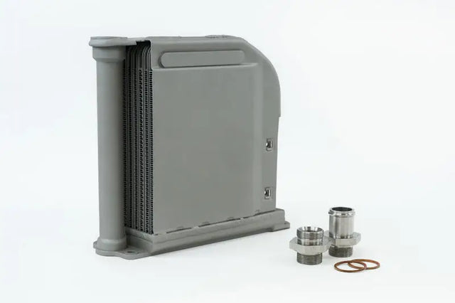 Gray heat exchanger with fittings for Porsche 911 engine oil cooler upgrade