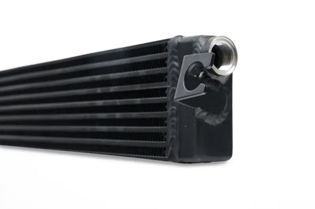 Black aluminum intercooler from CSF BMW E30 DTM race style oil cooler setup