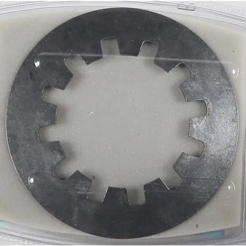 Metal lock washer with inner teeth for CSK903 clutch springs and clutch assemblies