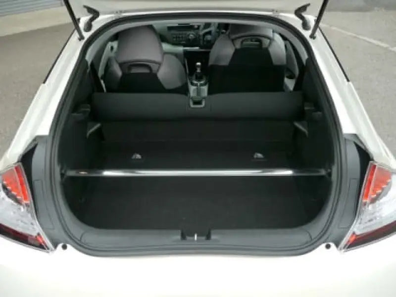 Open hatchback trunk showing Cusco CR-Z Strut Bar OS Rear for improved support