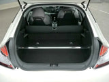 Open hatchback trunk showing Cusco CR-Z Strut Bar OS Rear for improved support