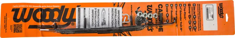 Orange blister pack with Woody’s snowmobile carbide runner kit for DA4-9750 Dooly