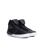 Black high-top sneakers with white soles from Dainese Metractive Air Shoes for maximum comfort