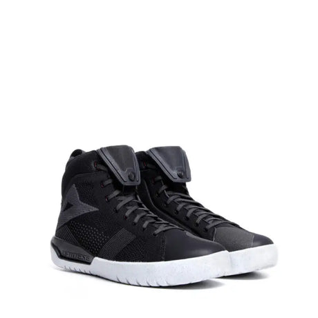 Black high-top sneakers with white soles from Dainese Metractive Air Shoes for maximum comfort