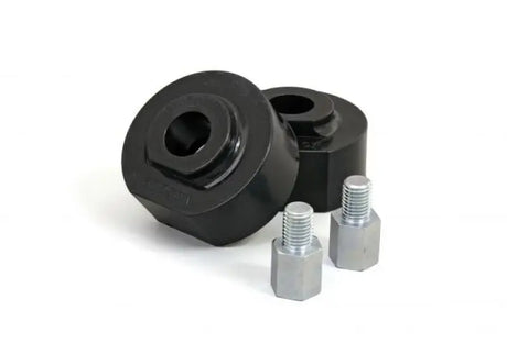 Black polyurethane bushings with metal adapters for Ford Bronco leveling kit coil spacers