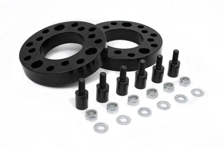Daystar 2009-2021 Ford F-150 Front 4WD/2WD 2in Leveling Kit with suspension strut spacers, hardware, and easy install components.