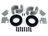 Daystar 2014-2020 Jeep Grand Cherokee 2.0 Inch Lift Kit components including spacers, bolts, and metal plates.