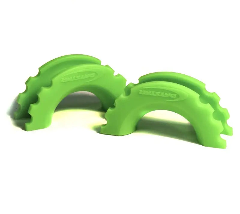 Two green arched shackle isolators in fluorescent green for Daystar D-Ring Shackle Pair