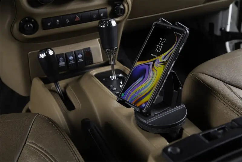 Daystar Universal Hands-Free Phone Grip in vehicle cup holder, providing 360° view rotation, ideal for RV, Automotive, Powersports, off-road, marine, exterior, truck accessories, interior, truck bed, RV parts, Truck & Automotive, AVADA - Best Sellers