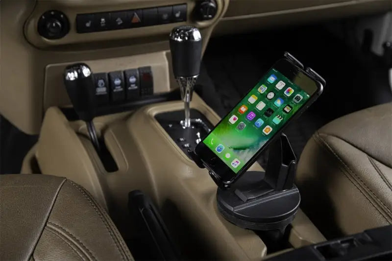 Hands-Free Phone Grip in vehicle cup holder, featuring secure hold, easy access to charger port, and 360° rotation, ideal for RV, Automotive, Powersports, off-road, marine, exterior, truck accessories, interior, truck bed, rv parts, Truck & Automotive, AVADA - Best Sellers