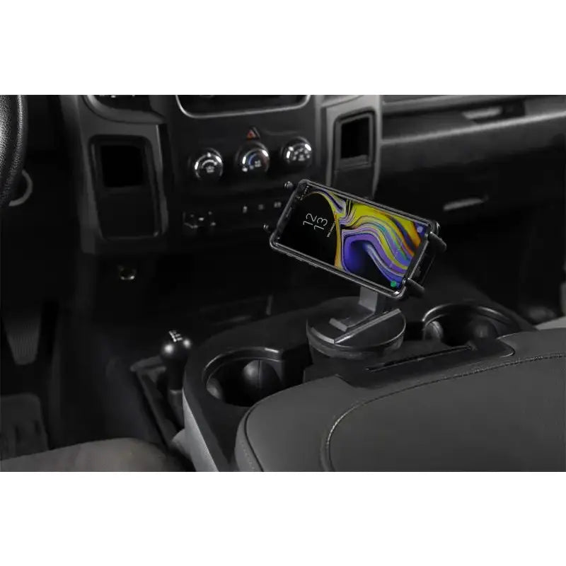 Daystar Universal Hands-Free Phone Grip, black, installed in vehicle cup holder with smartphone, RV, Automotive, Powersports, off-road, marine, exterior, truck accessories, interior, truck bed, rv parts, Truck & Automotive, AVADA - Best Sellers