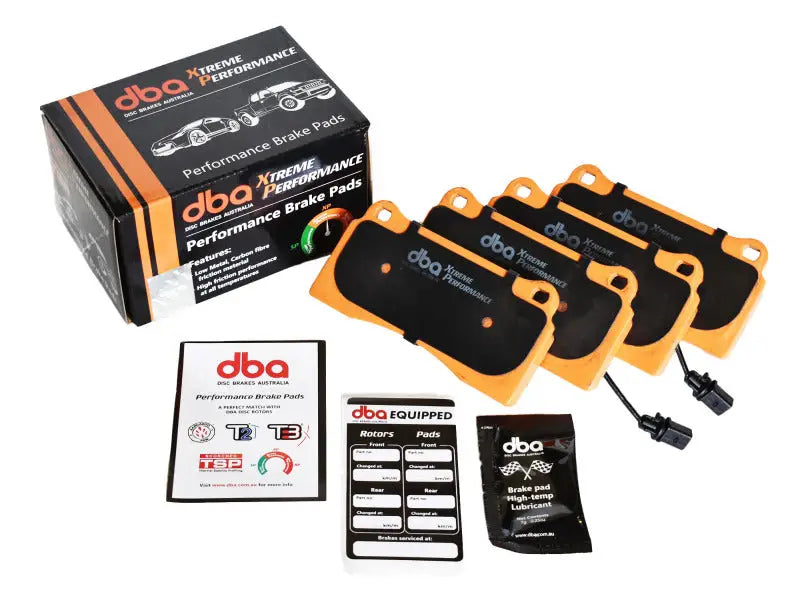 DBA Xtreme Performance brake pads for Nissan Patrol Y62, orange black accents, durable metal for high temperatures