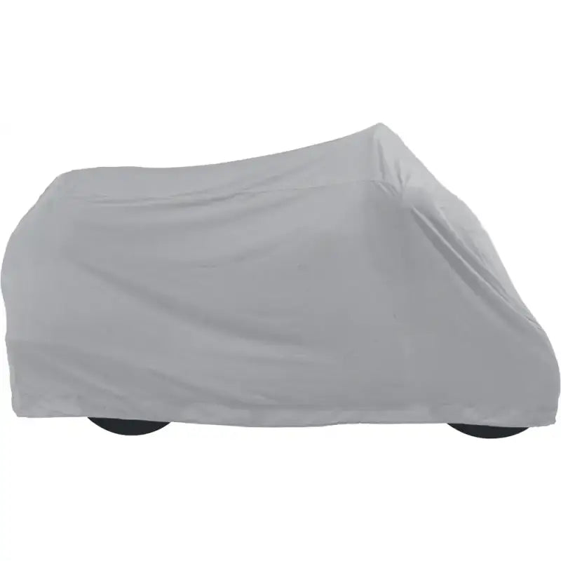 Grey dust cover DC-505-04-XL, water-resistant and breathable, fully covering a parked bike indoors.