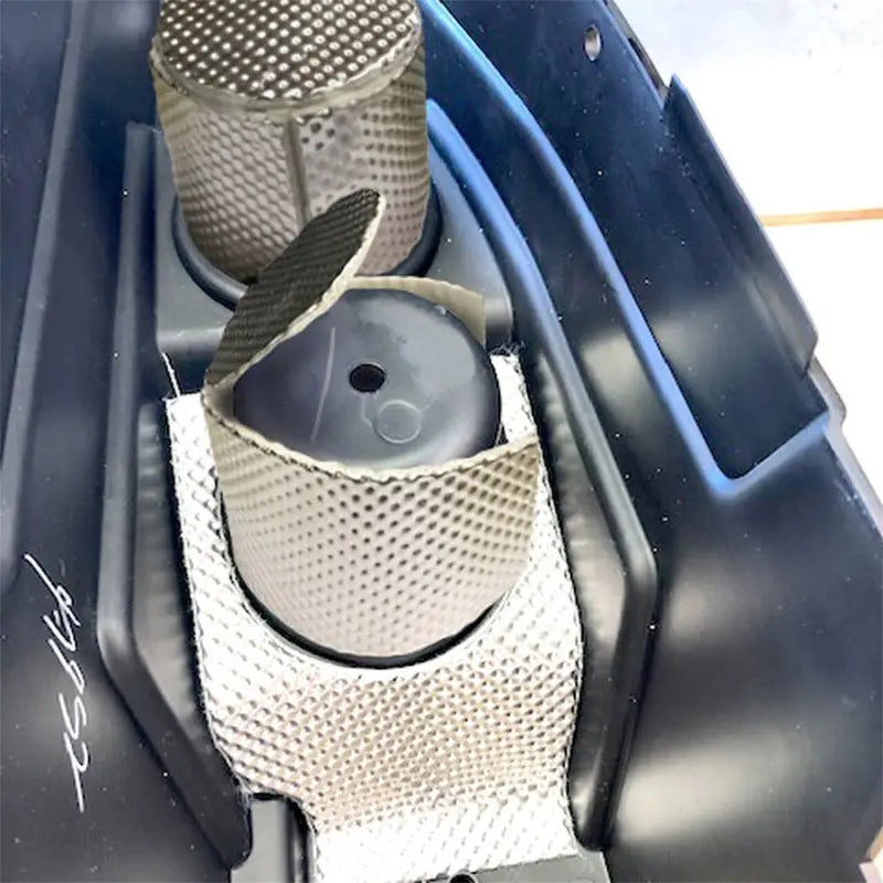 Cylindrical heat shielding components for RZR Polaris center console heat control kit
