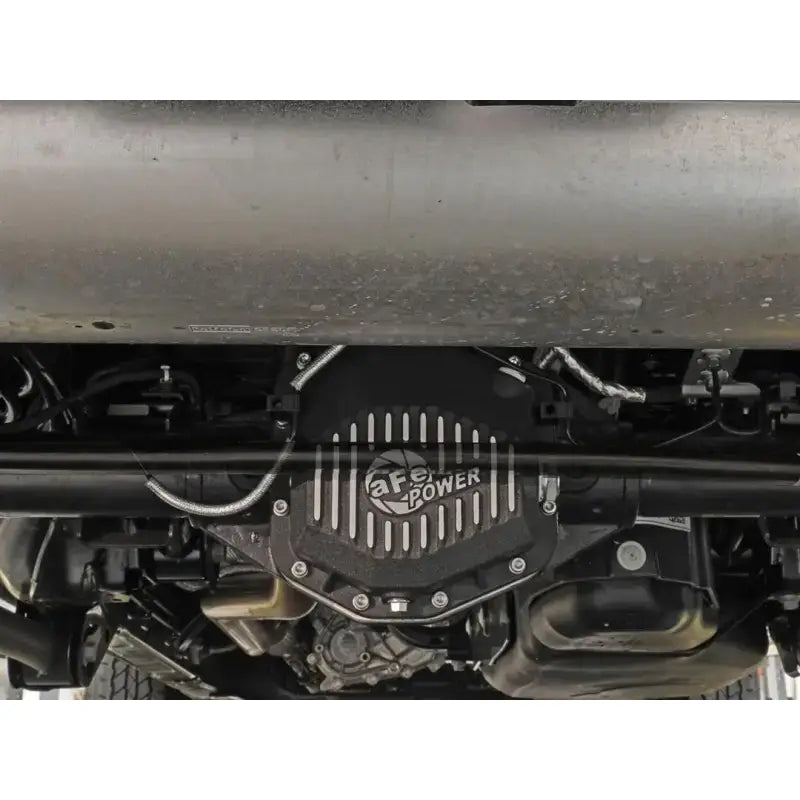 Black dielectric cover with cooling fins for Dana M220 with magnetic drain plug