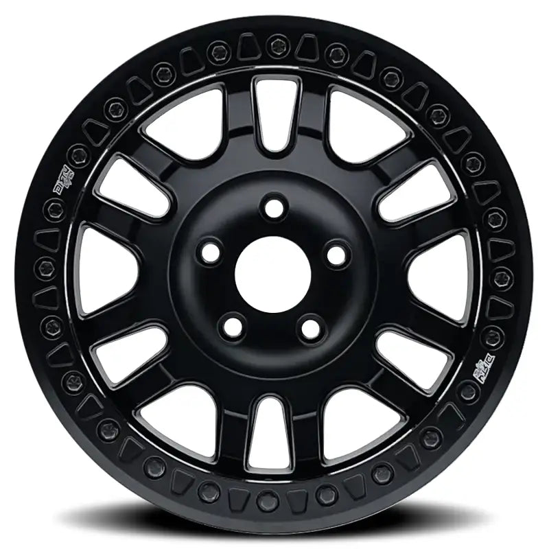 Matte black Dirty Life Canyon Race alloy wheel with decorative rim design