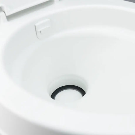 Dometic 300 Series RV Toilet with Easy Clean Design features a round seat and triple-jet bowl rinse for effortless cleaning.