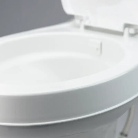 Dometic 300 Series RV Toilet with Easy Clean Design features a round seat and pedal flush for effortless maintenance.