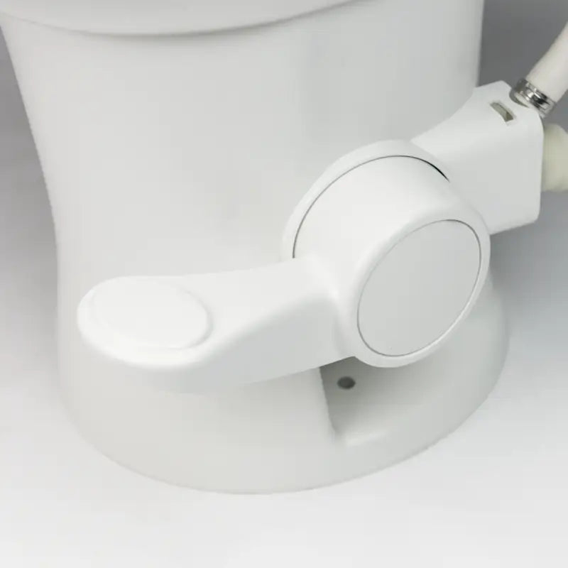 White bidet attachment on Dometic 320 Series RV Toilet with vitreous ceramic bowl