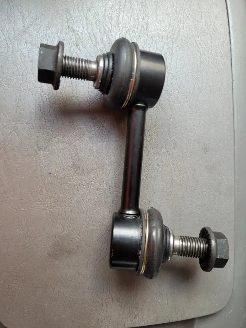 Black metal sway bar link from Dorman SL59041 stabilizer bar link kit for easy upgrade